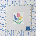 Coming soon preview of the Spring Bouquet beginner needlepoint kit with colorful flowers on 13 mesh canvas